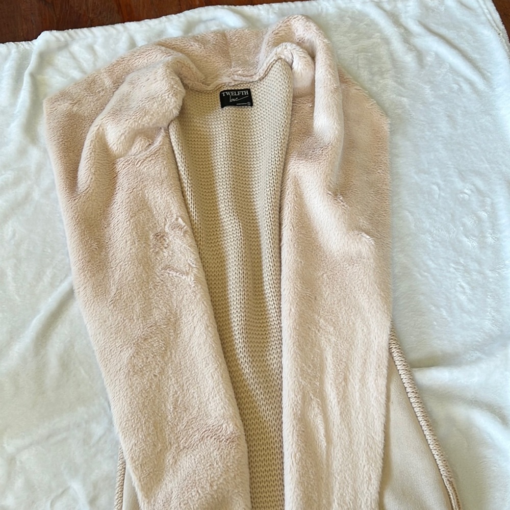 Cute fur vest to dress up over dresses or skirts